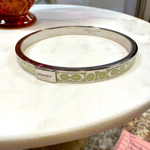 COACH - Signature C Cream Enameled Silver Bangle Bracelet - Picture 2 of 12
